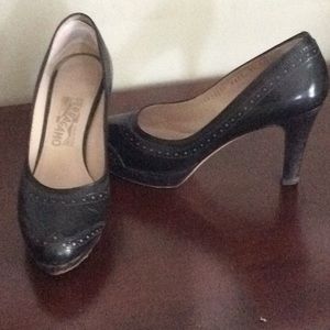 Ferragamo pumps, black with eyelet cutout detail